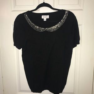 Jeweled neckline short sleeve sweater.